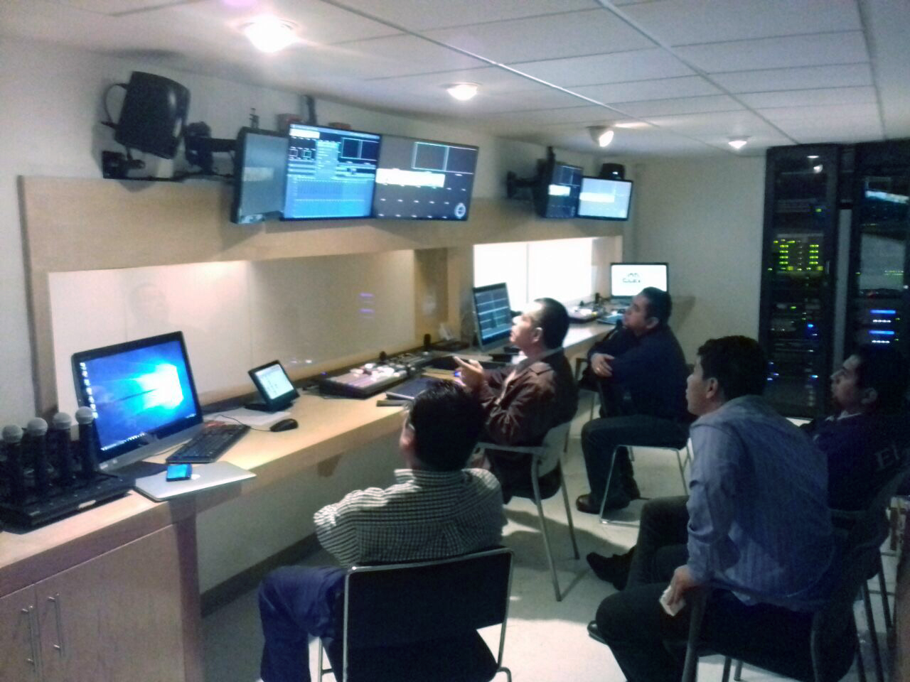 ColMex technicians monitoring and operating the XTP system in shared control room