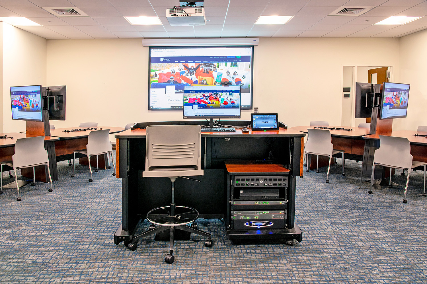 Having the AV system components rack-mounted within the instructor station kept the installation local without taking floor space with a rack in a corner or needing a separate equipment room.
