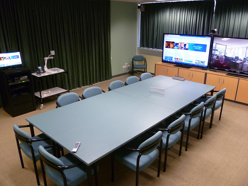 Each videoconference room includes a DVS 605 A for scaling and switching.
