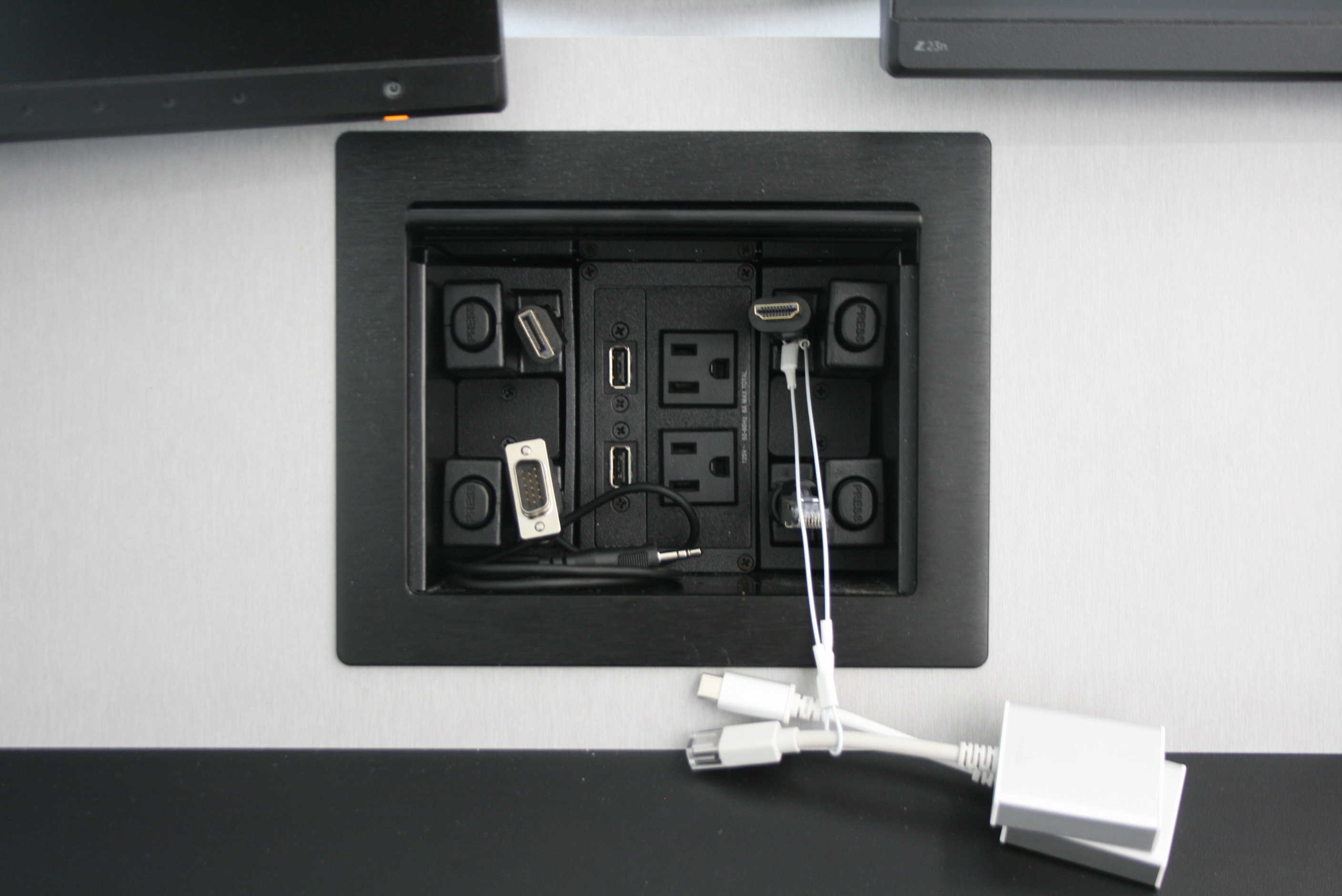 A teaching station with an Extron Cable Cubby enclosure