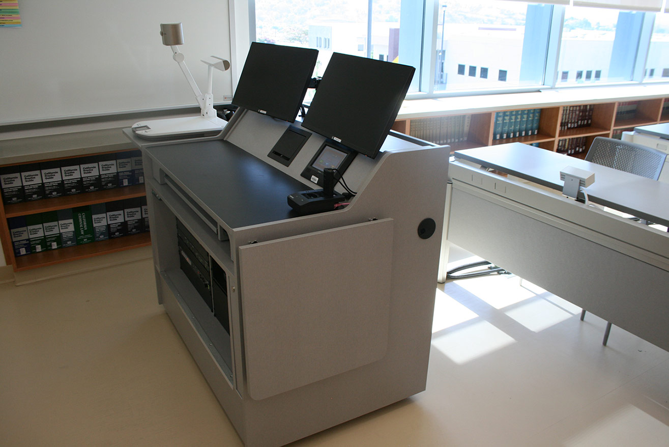 AV system components placed inside a custom teaching station