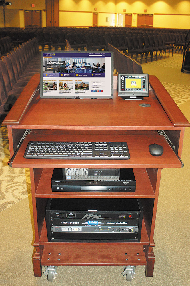 The TouchLink Pro touchpanels mounted on lectern