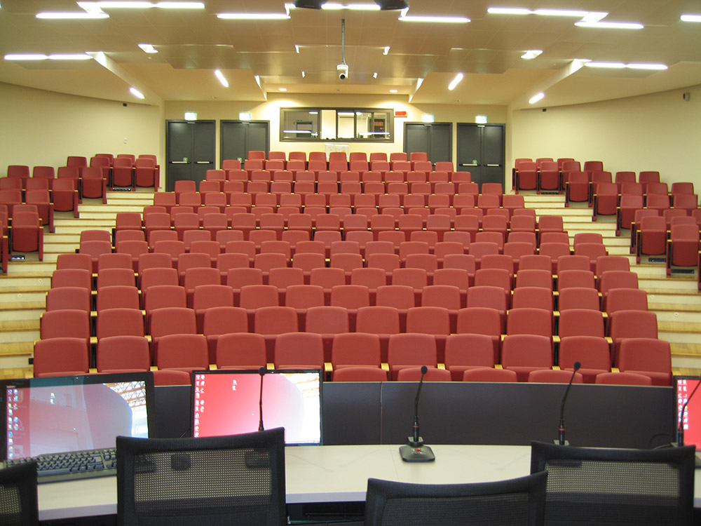Presentation in the auditorium can be monitored and controlled from the front of the room, through the control room at the back, or remotely via tablet.