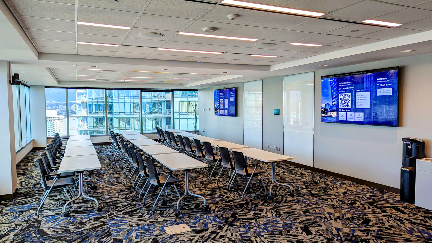 The larger Stanley Park Boardroom features stunning views and is equipped with two 86″ displays.