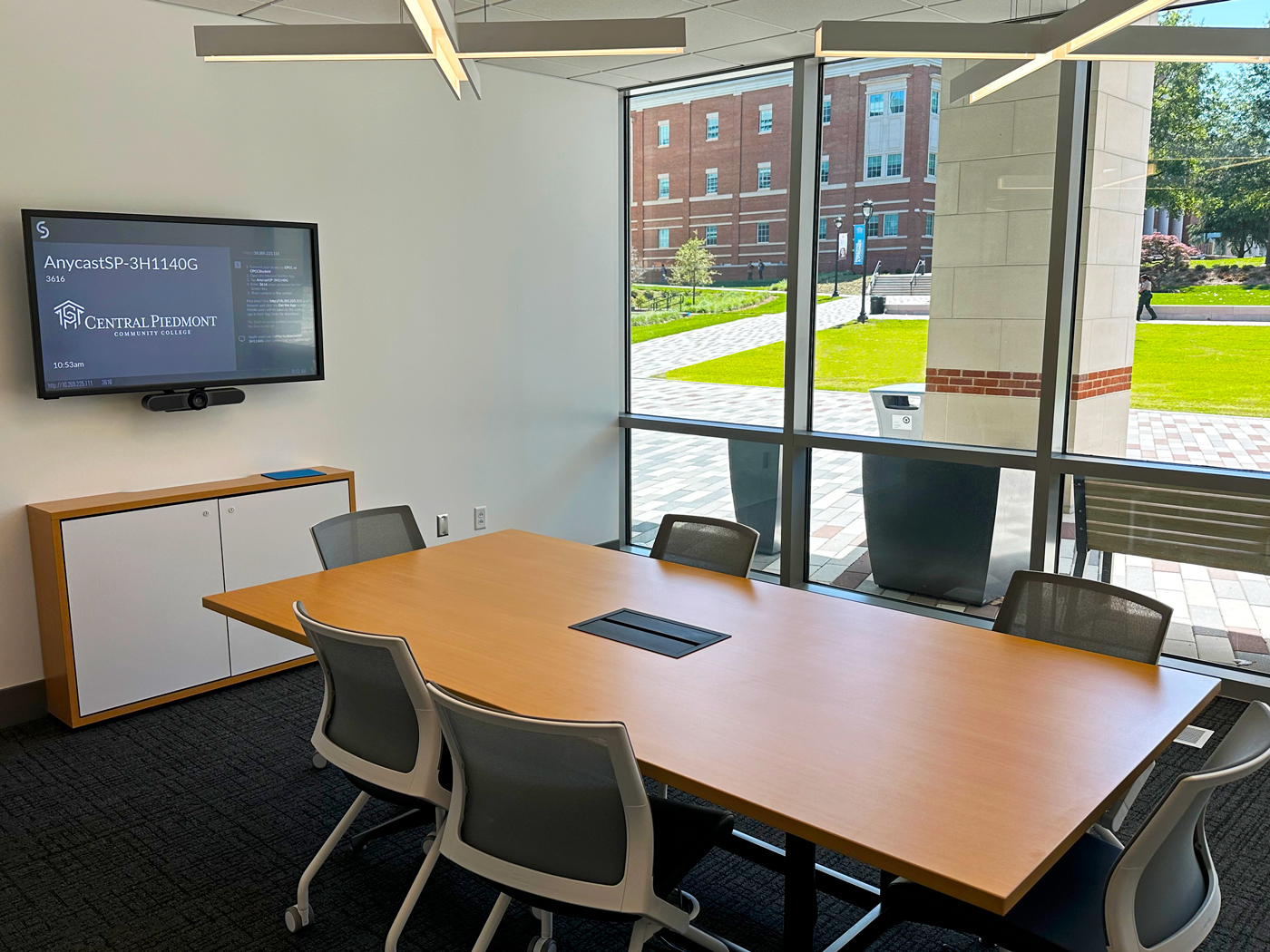 Conference rooms of various configurations and capacities are available on all three interior levels of the Parr Center. The conference rooms rely on HC 404 collaboration systems and IN1604 scalers for AV connectivity. Some of the conference rooms include CCR 30 control panels for selecting wireless sharing with the push of a button.