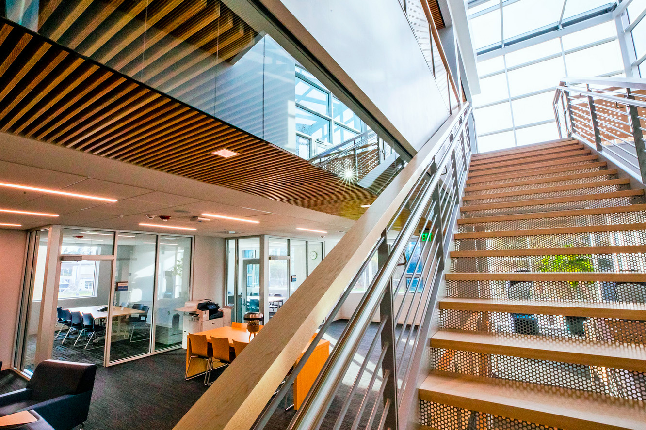 Open study areas and huddle spaces with AV connectivity and display  are available throughout the new collaboration building.