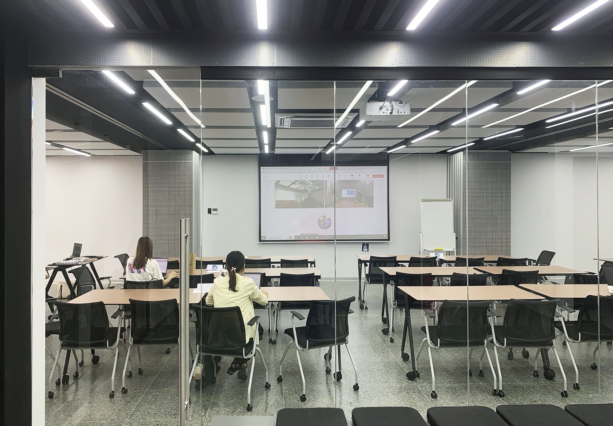 Third floor meeting room equipped with Extron audio DSP and control streamlines AV for collaborative discussions and executive briefings.