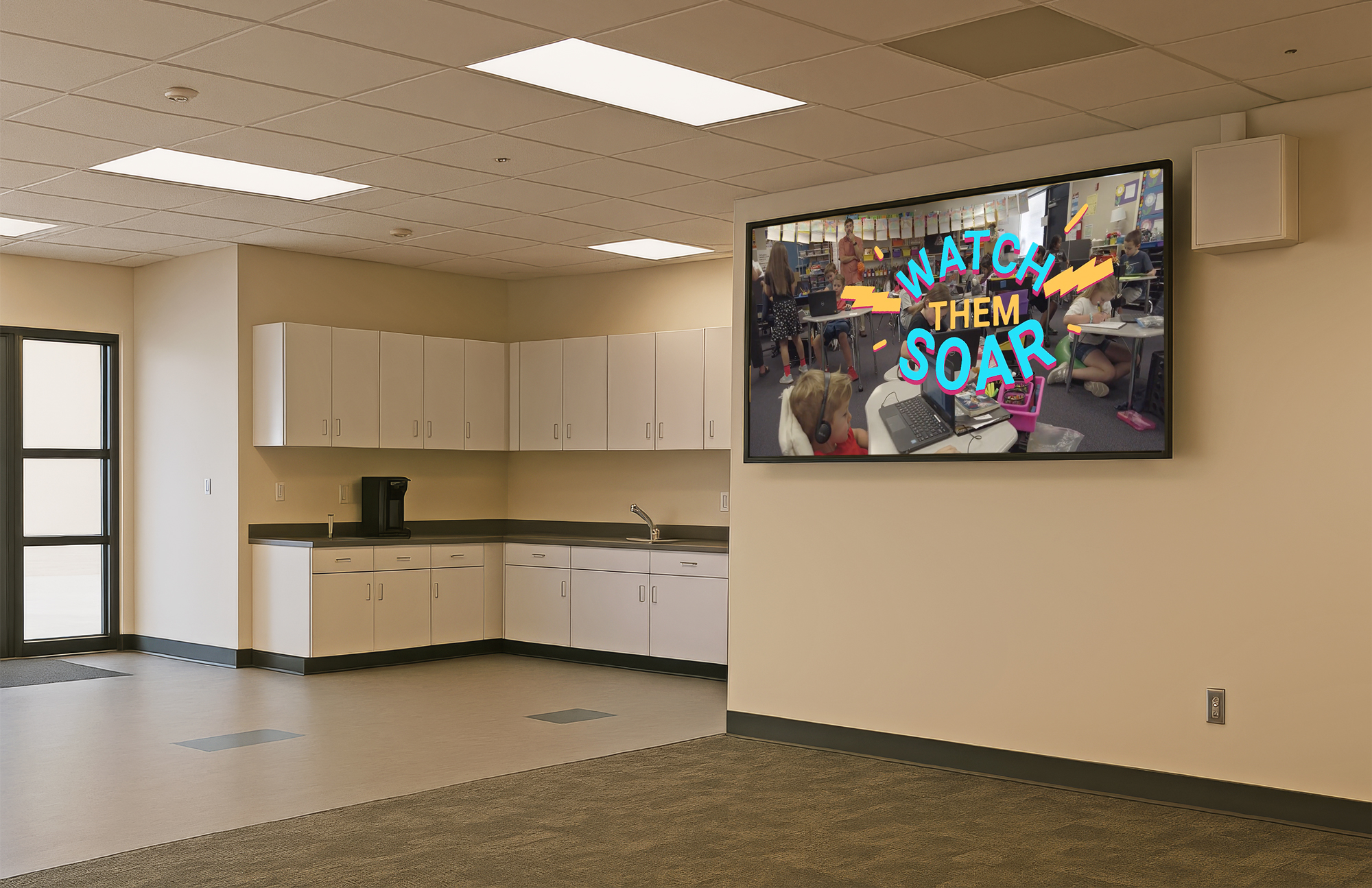 The lobby duplicates the AV system design used in the classrooms, with a flat panel display and Flat Field ceiling speakers driven by a PVCA 452 amplifier and controlled by an EBP 100 button panel.