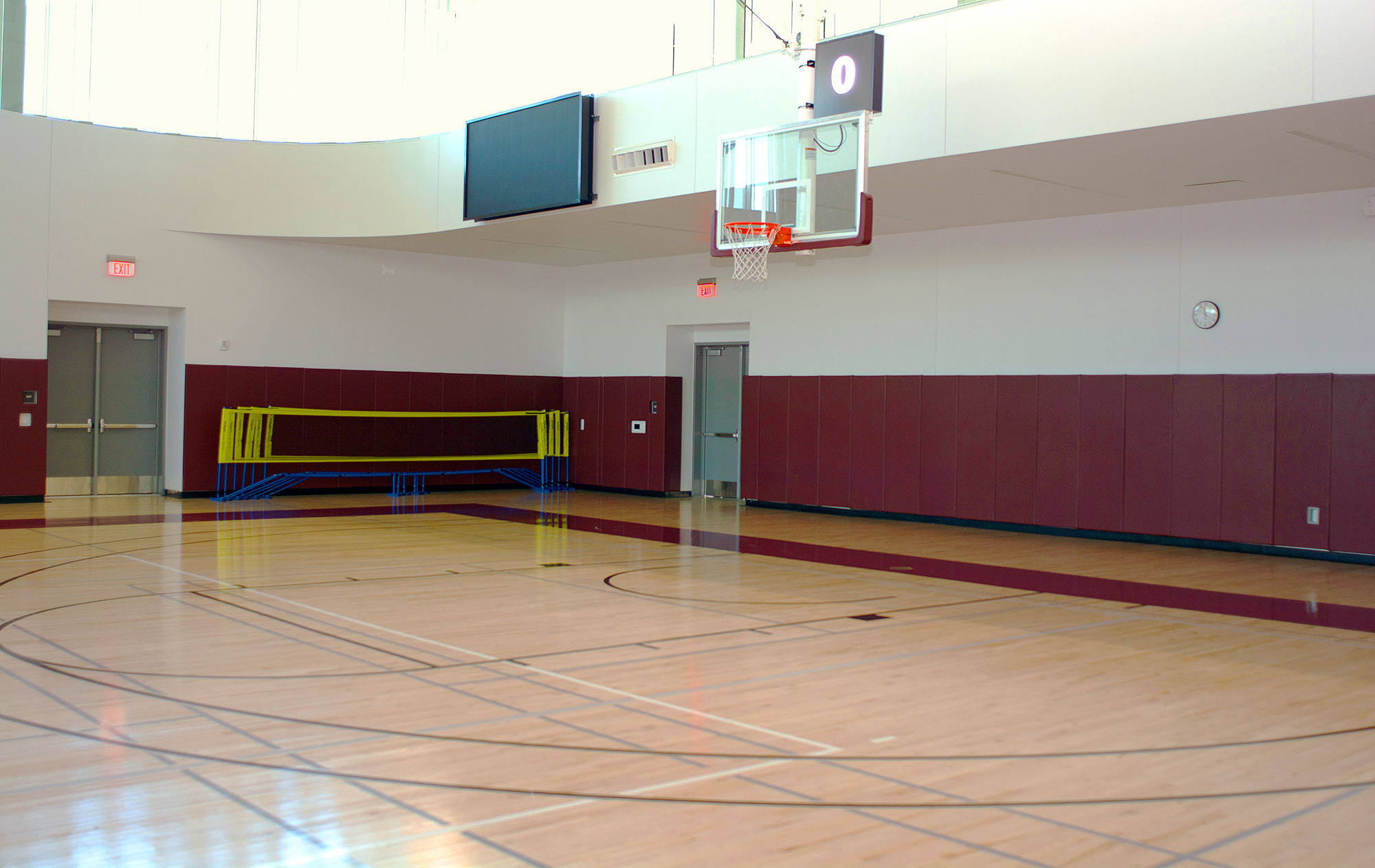 The NAV system delivers distinct content from a PC running the scoreboard software to the videowall in the multipurpose gym, which is used for tournaments and as warmup or practice space.