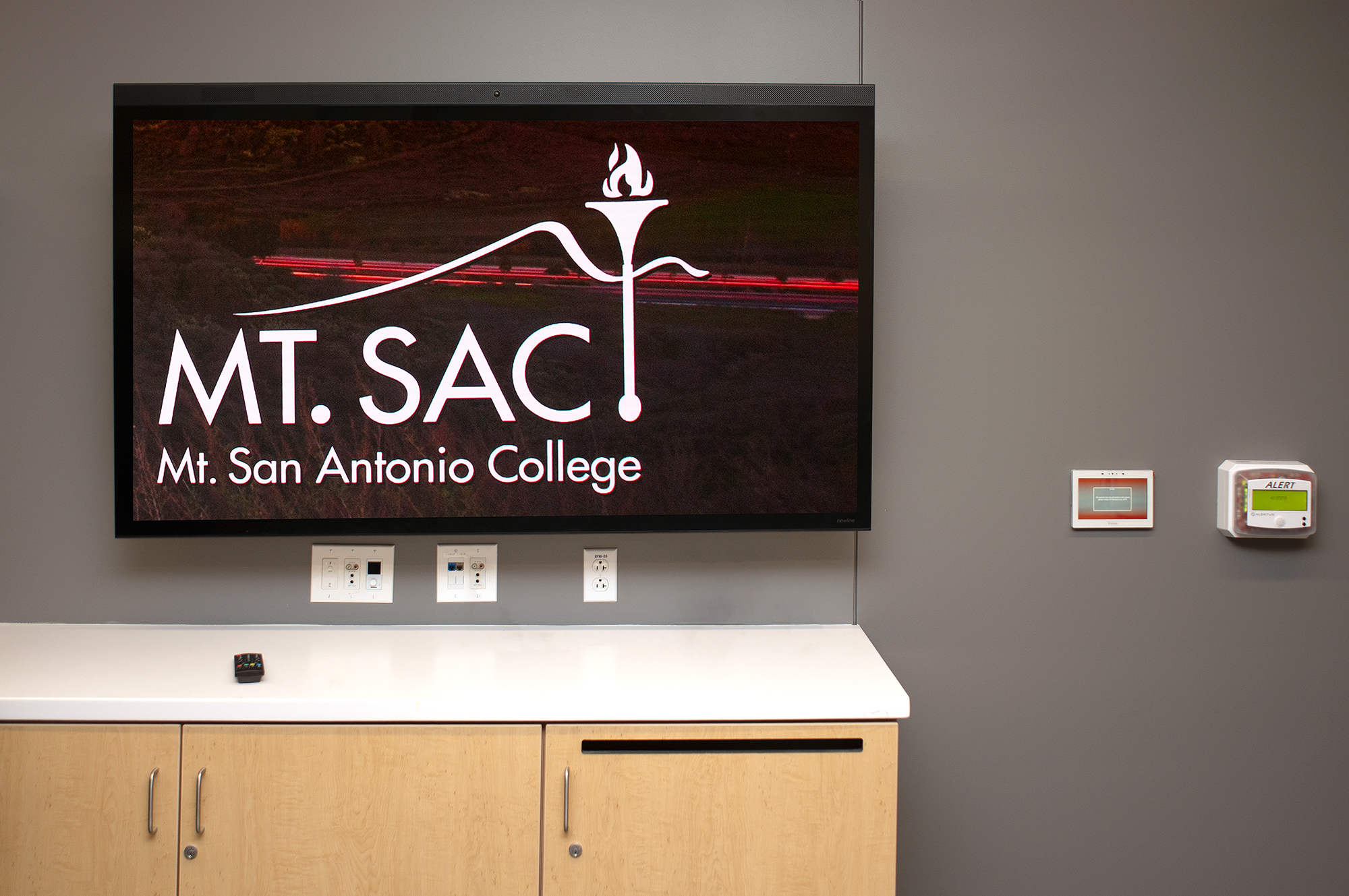 Locker room displays include AV connectivity for authorized devices, allowing playback of content such as game highlights captured from the bench.