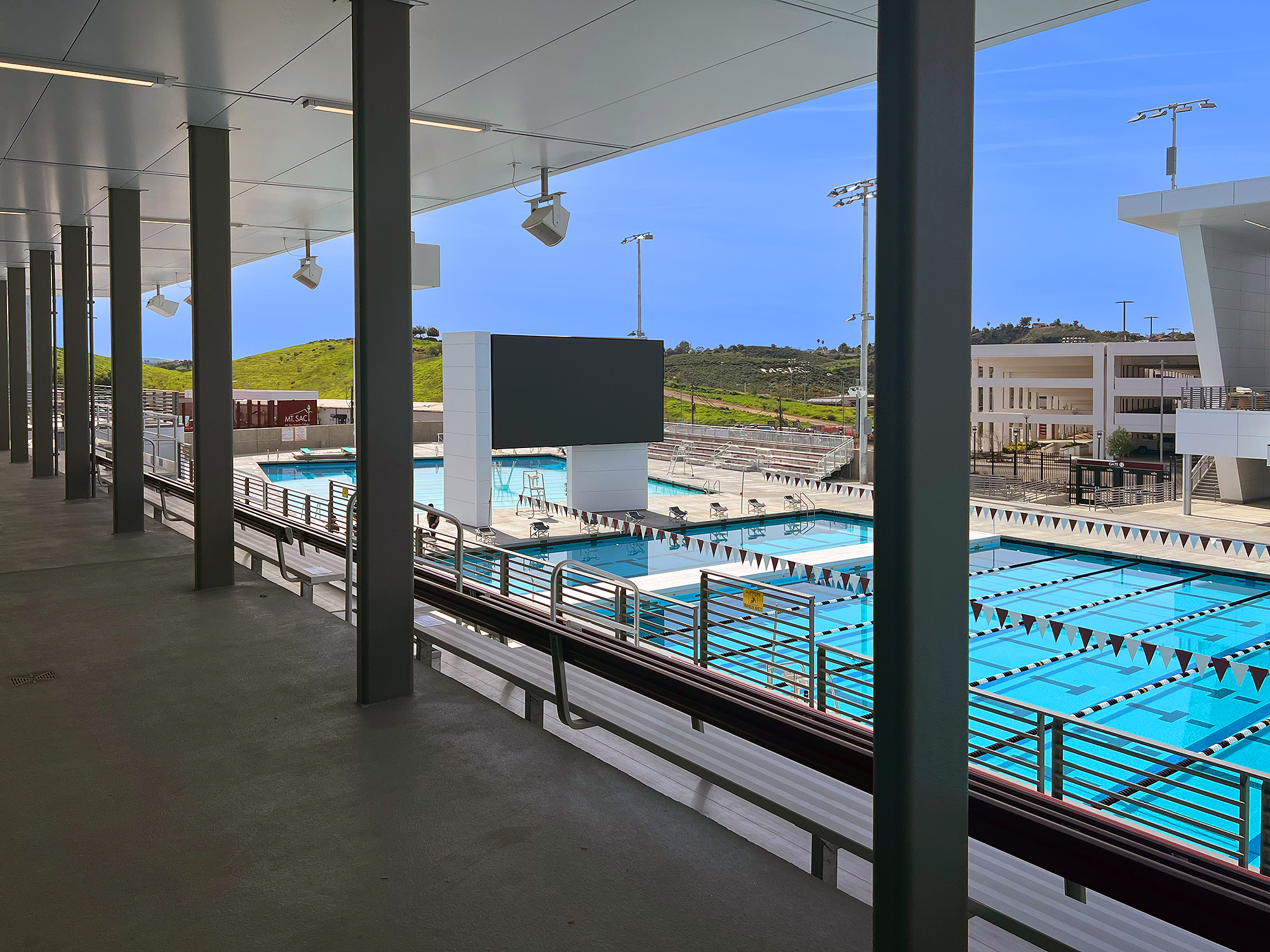 The track around the second floor of the gym features glass walls that allows runners to see into the gyms, the aquatic center, and outside.