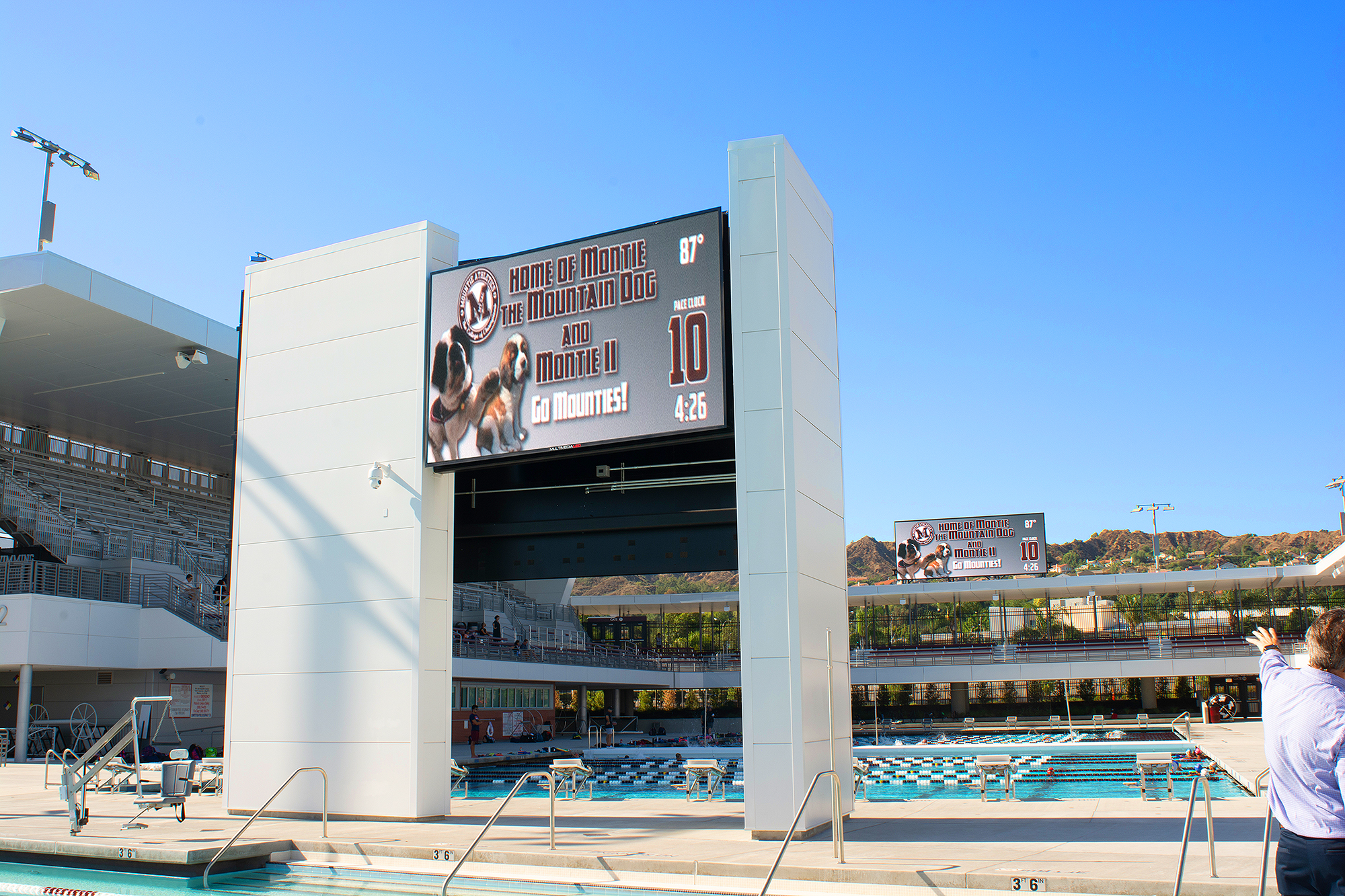 The scoreboard software for the main pool has unique resolution requirements. Installing a NAV scaling decoder at the scoreboard easily solved this challenge.