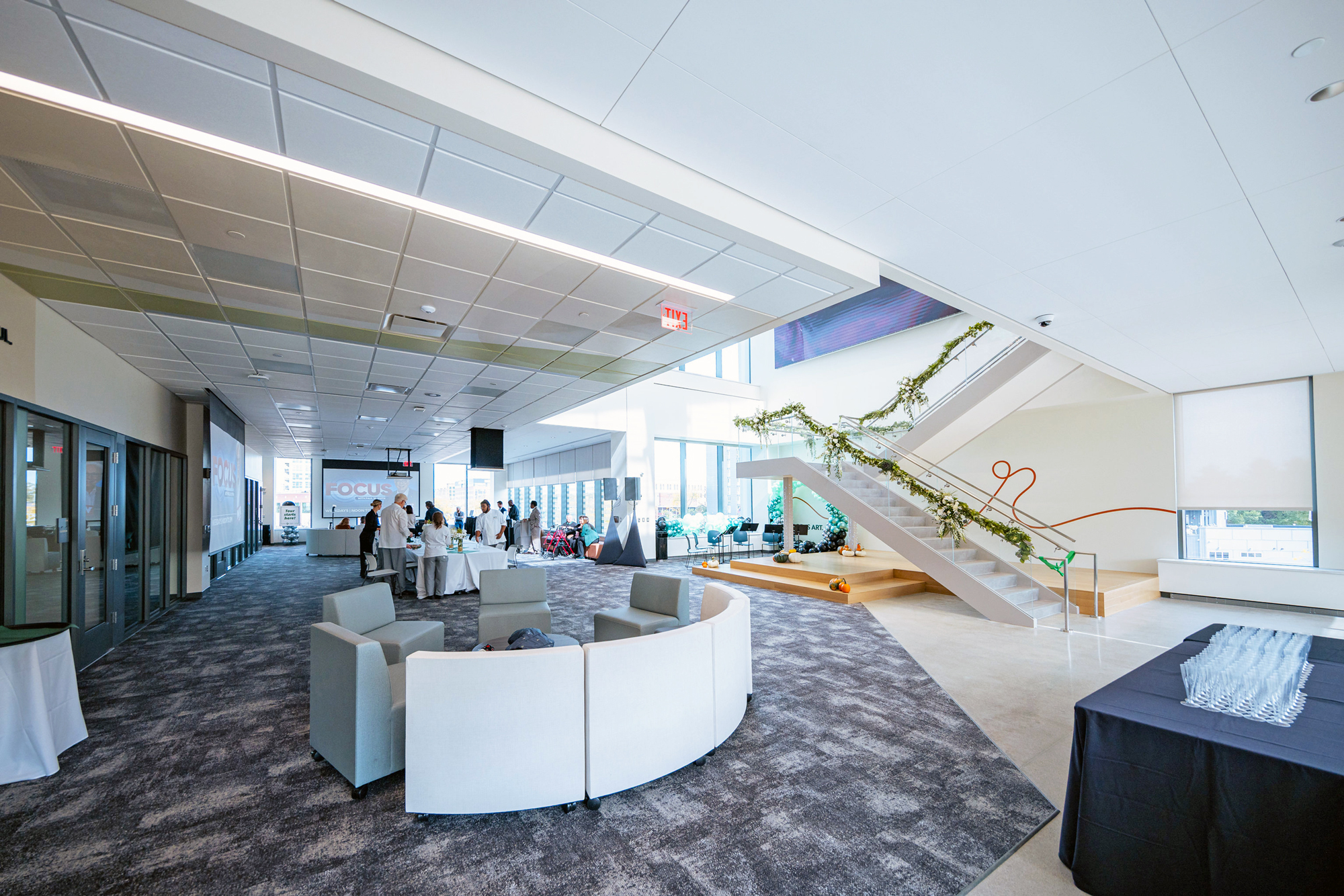 Second floor Flex Zone with two projectors and two projection screens, plus videowall in the stairwell.
