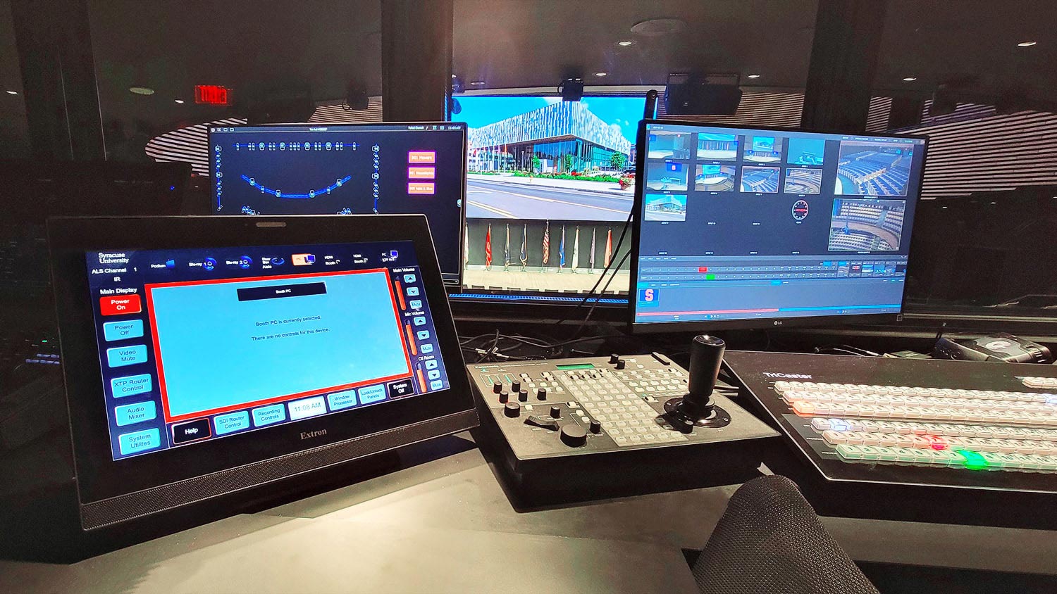 The support staff uses an Extron TLP Pro 1725TG 17” Tabletop TouchLink Pro Touchpanel to operate the AV system for the presenter.