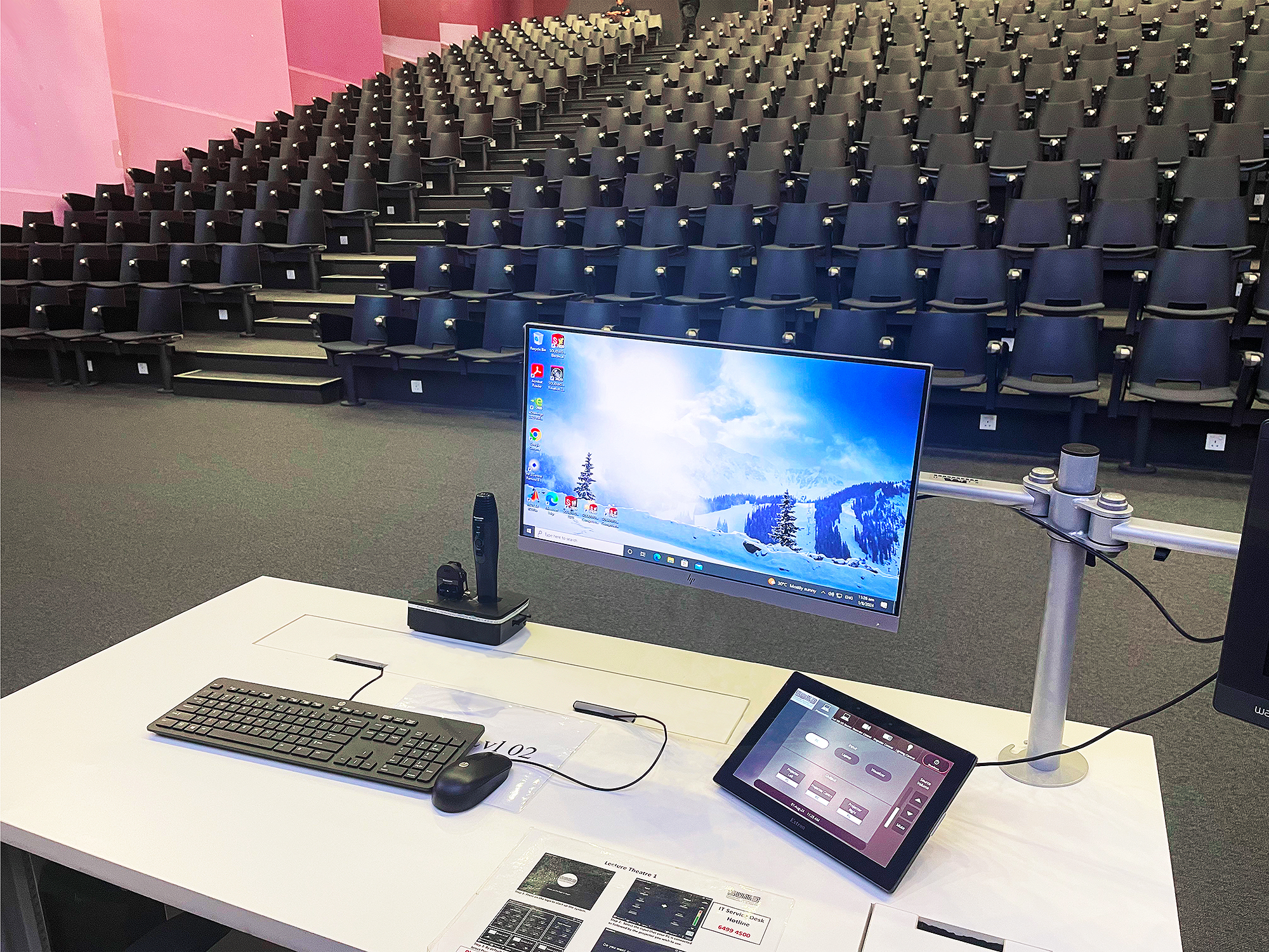 Extron’s intuitive control panel at the presenter’s table in Lecture Theater 1 allows for effortless management of AV systems, ensuring smooth transitions between content during lectures.