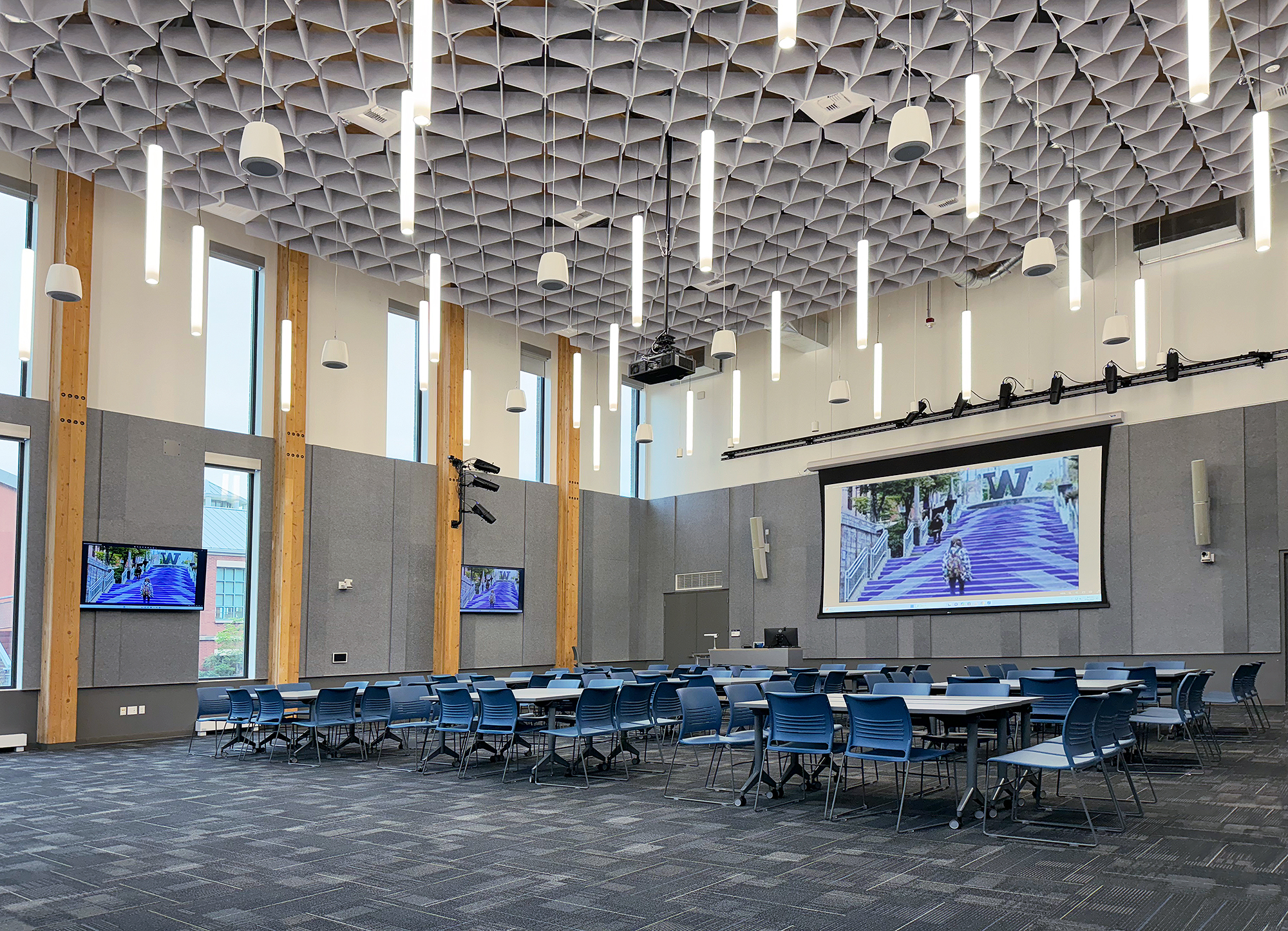 The High Impact Practices (HIPs) seminar venue on the ground level of Milgard Hall functions as a large classroom and community event space. The Association of American Colleges and Universities defines HIPs spaces as incorporating designs and practices in teaching and learning that increase student engagement.