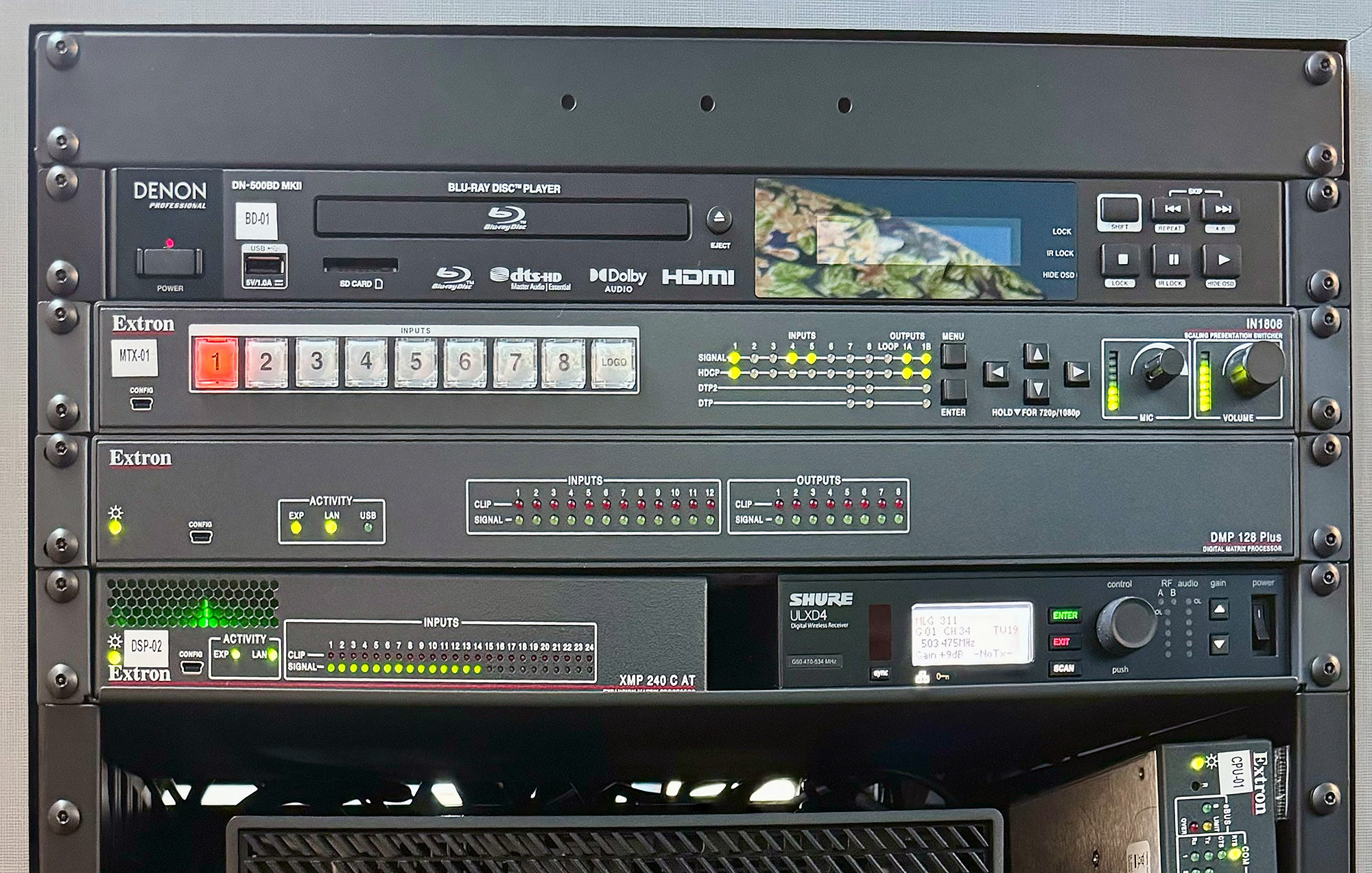 Detail view of Extron equipment in classrooms 301 and 311 AV equipment racks.