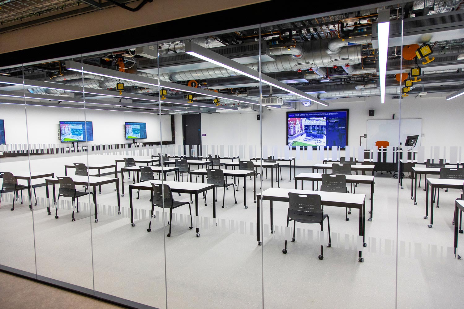 Meet & Teach rooms are designed to be flexible, supporting lecture or collaborative groups. In large and mid-sized rooms, an Extron XTP system or a scaling presentation switcher provides AV signal routing from connected and wireless sources to the multiple displays.