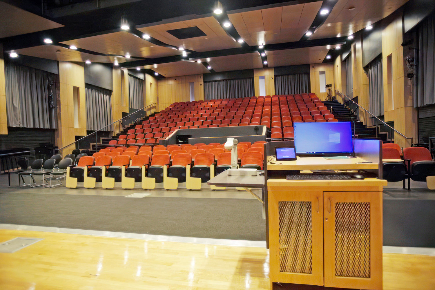 Thumbnail - The 4,600 square foot lecture hall at the Northern Wake Campus includes a stage facing an audience of 275. Equipped with theatrical caliber video, audio, stage lighting, and house lighting, the lecture hall is ideal for hosting presentations, plays, singing competitions, local television broadcasts, and more. All photos courtesy of Wake Technical Community College.