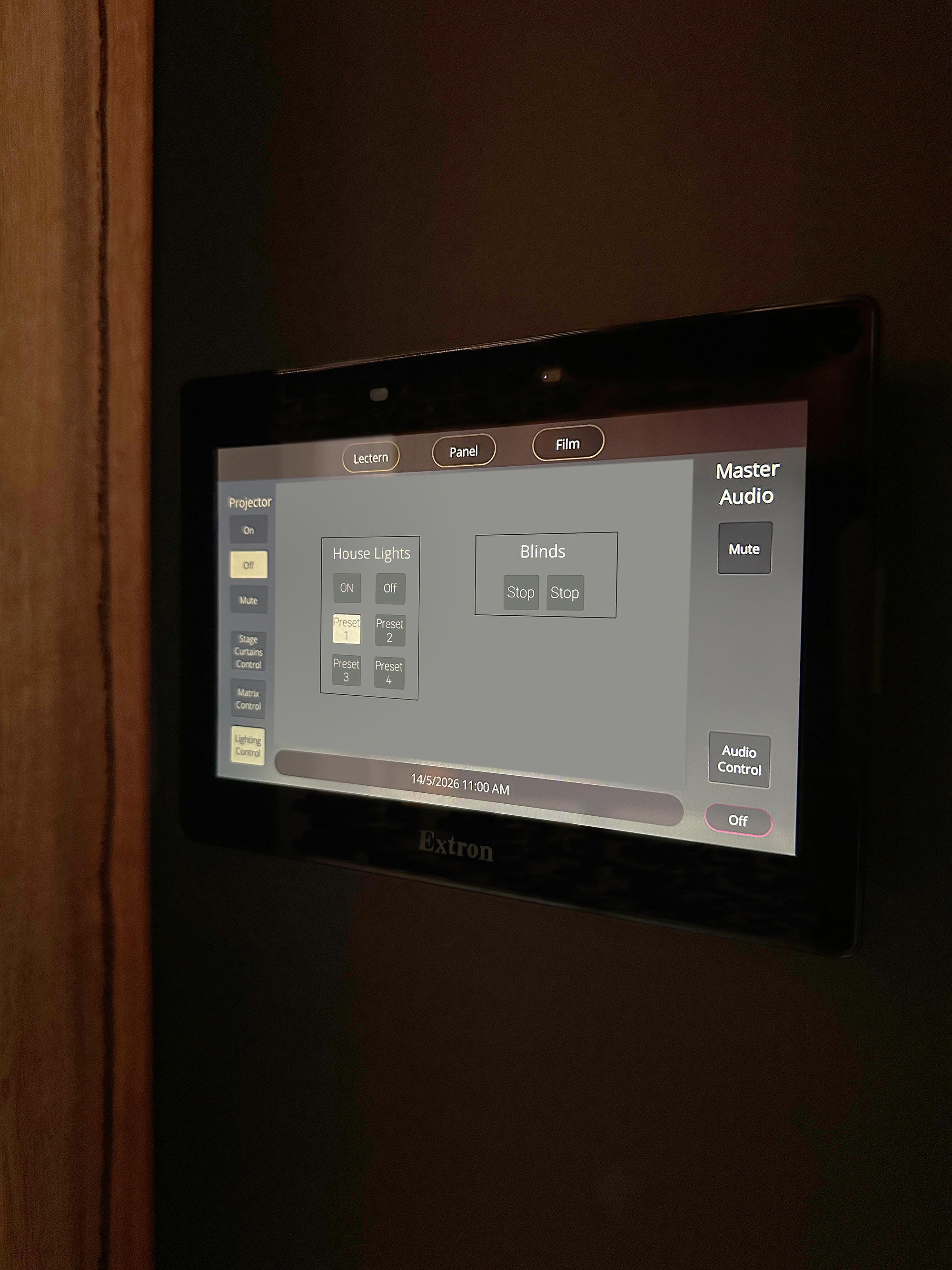 A 10-inch TLP Pro touchpanel mounted backstage provides a simplified control interface for lights, blinds, audio levels, and more on a single screen.