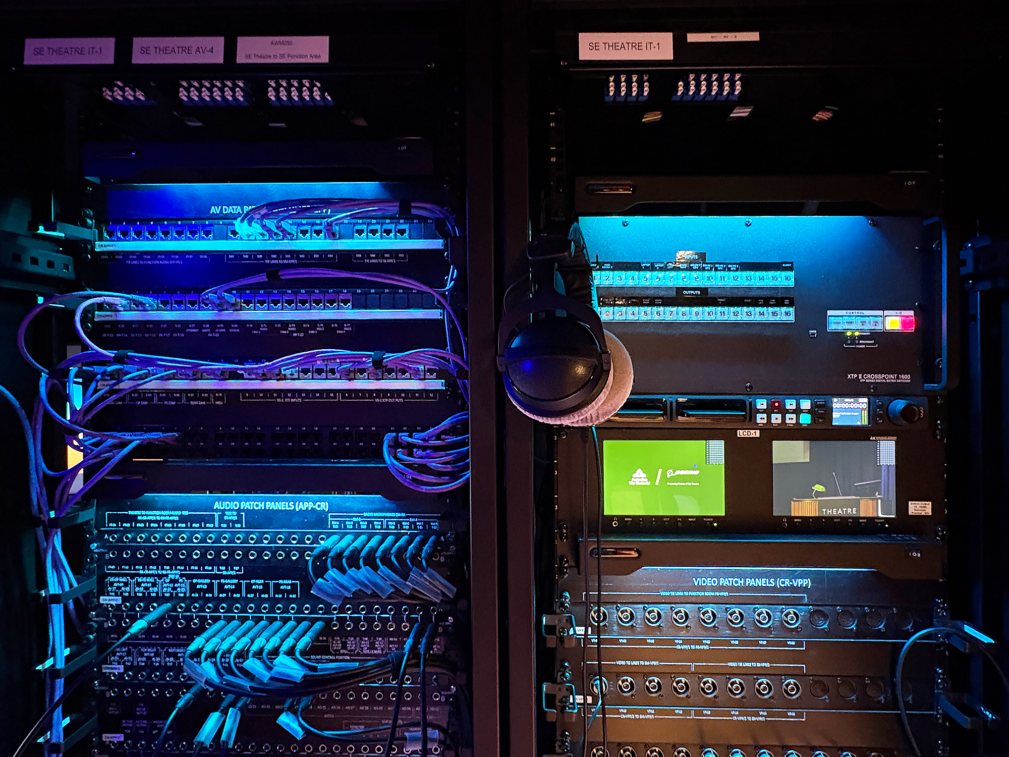 AV distribution and switching are handled by two Extron XTP II CrossPoint 1600 matrix switchers configured as fully populated 16x16 systems.