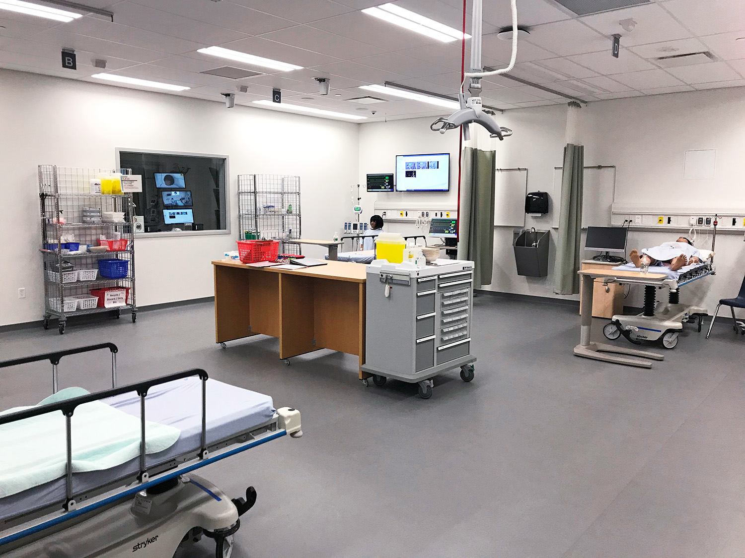 Each simulation lab includes as many as eight bed stations. A patient simulator is connected to the vital signs PC for that demonstration bed station prior to the lesson.