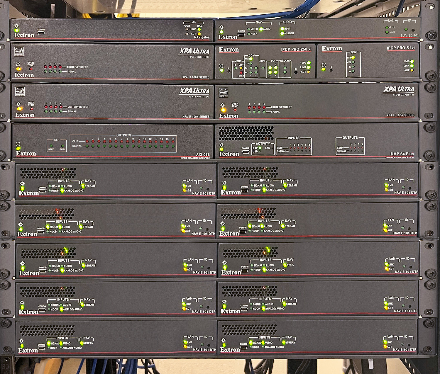 Core components of the AV system are located in the Intermediate Distribution Frame (IDF) equipment room. Included are AV over IP Ethernet switches, ten NAV E 101 DTP encoders and NAV scaling decoders, control processors, and audio amplifiers.