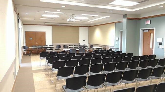 While this presentation room occupies only a quarter of the divisible conference area, it provides the same AV and control functionality as when the space is configured for town hall meetings.