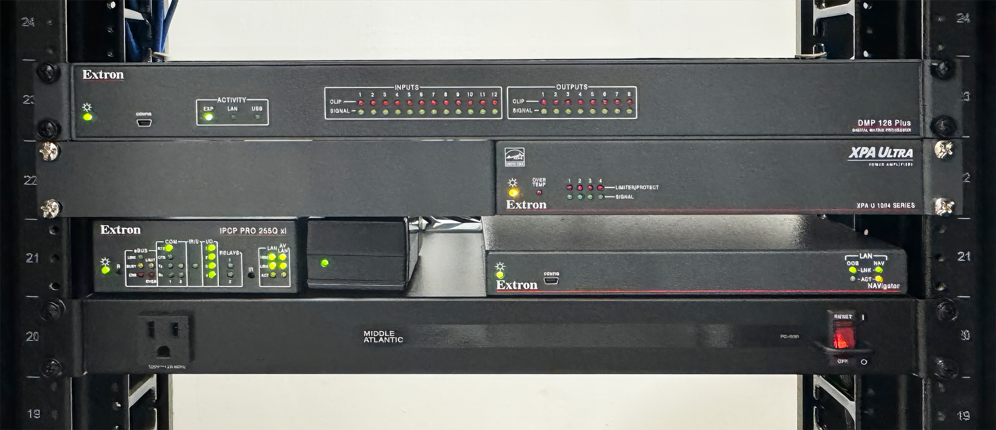 AV system central rack contains audio and control equipment.