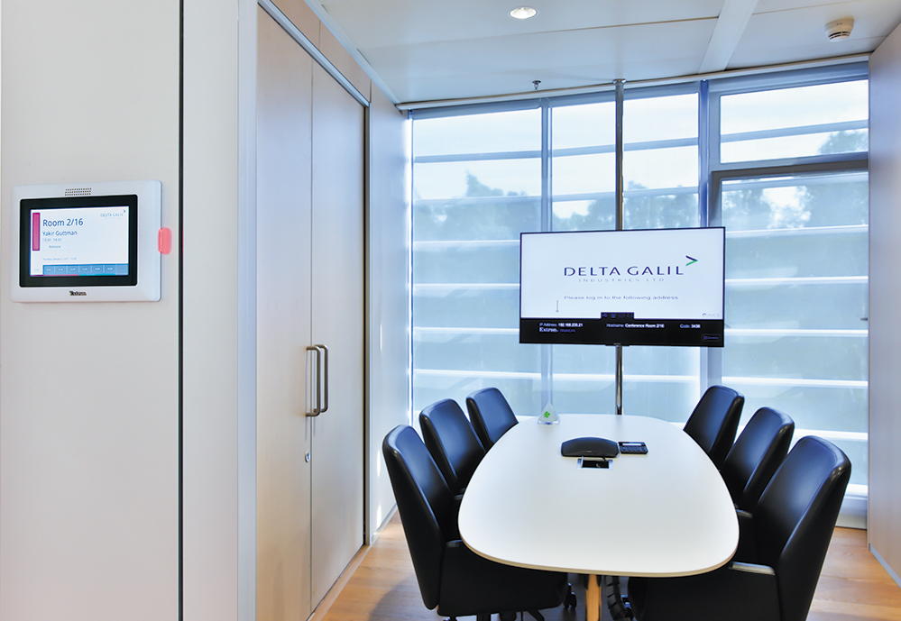 A typical meeting room is equipped with an IN1604 DTP for video scaling and distribution of audio, video, and control signals over DTP.