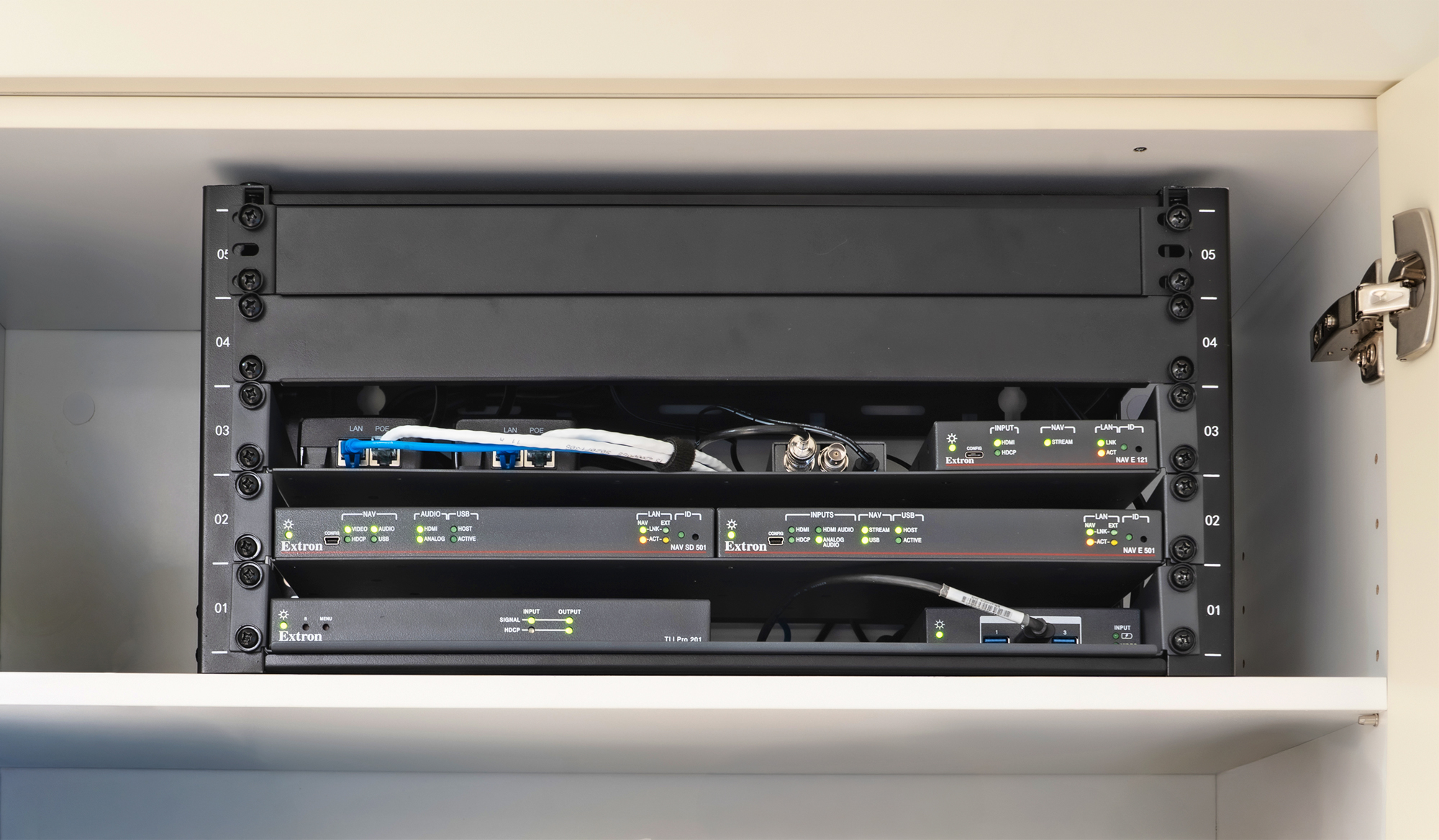 The compact, low profile enclosure of NAV System encoders and scaling decoders allows for discreet placement and concealment in cabinets and other small spaces.