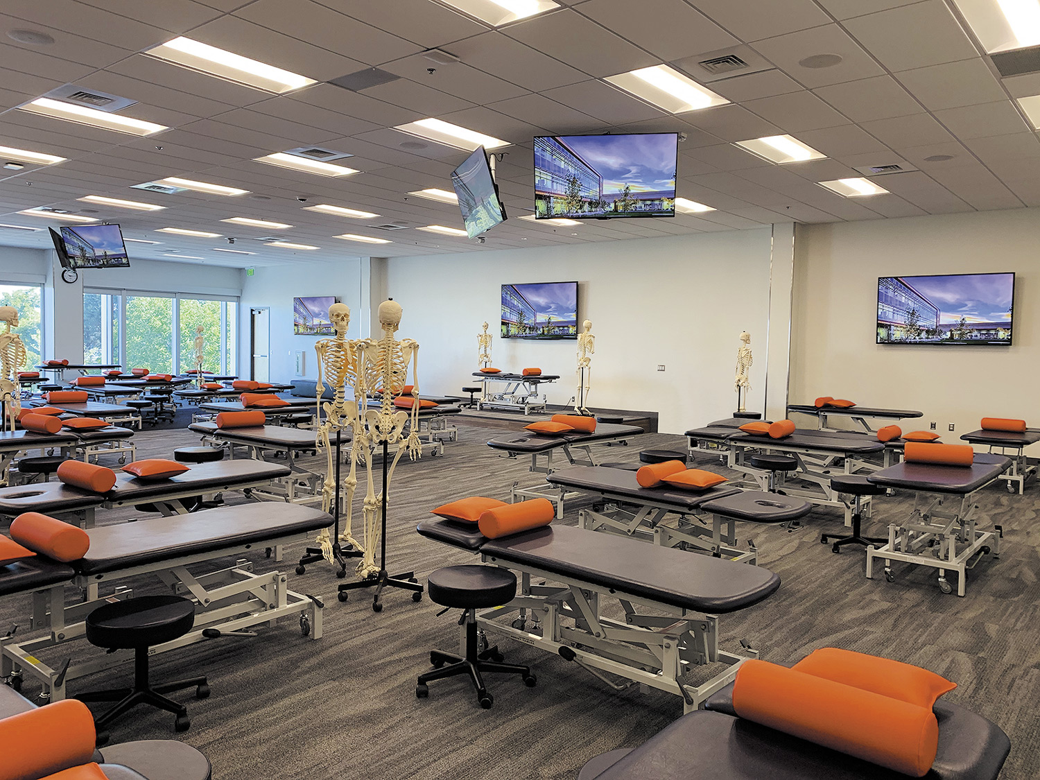 The Osteopathic Manipulative Medicine  – OMM lab includes multiple PTZ cameras and displays, capturing and presenting activities taking place at any of the 40 hydraulic treatment tables.