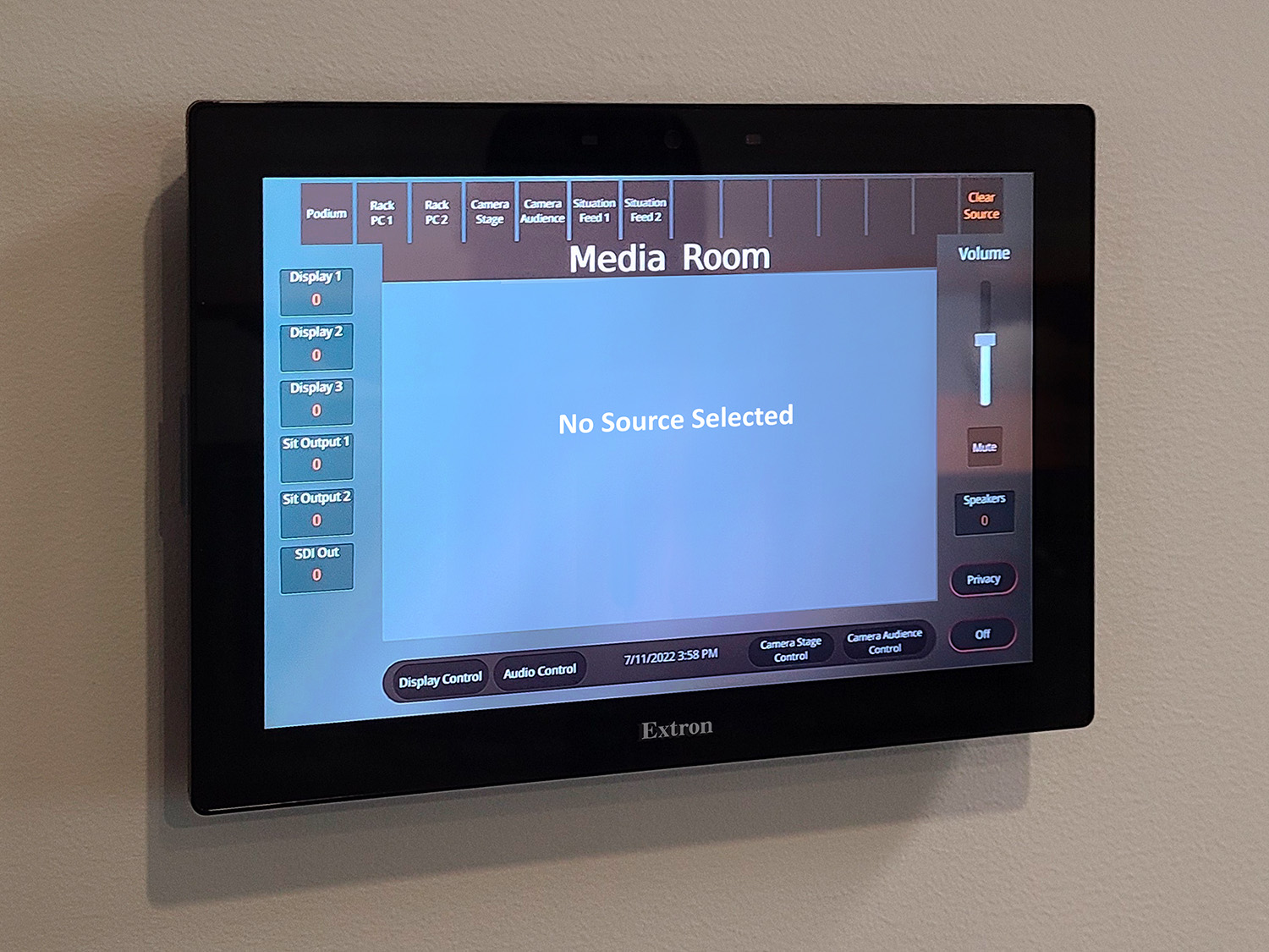 Thumbnail - TouchLink Pro touchpanels with an intuitive user interface such as this 10" wall-mount model in the Media Room facilitate easy selection of sources and display devices within the space.