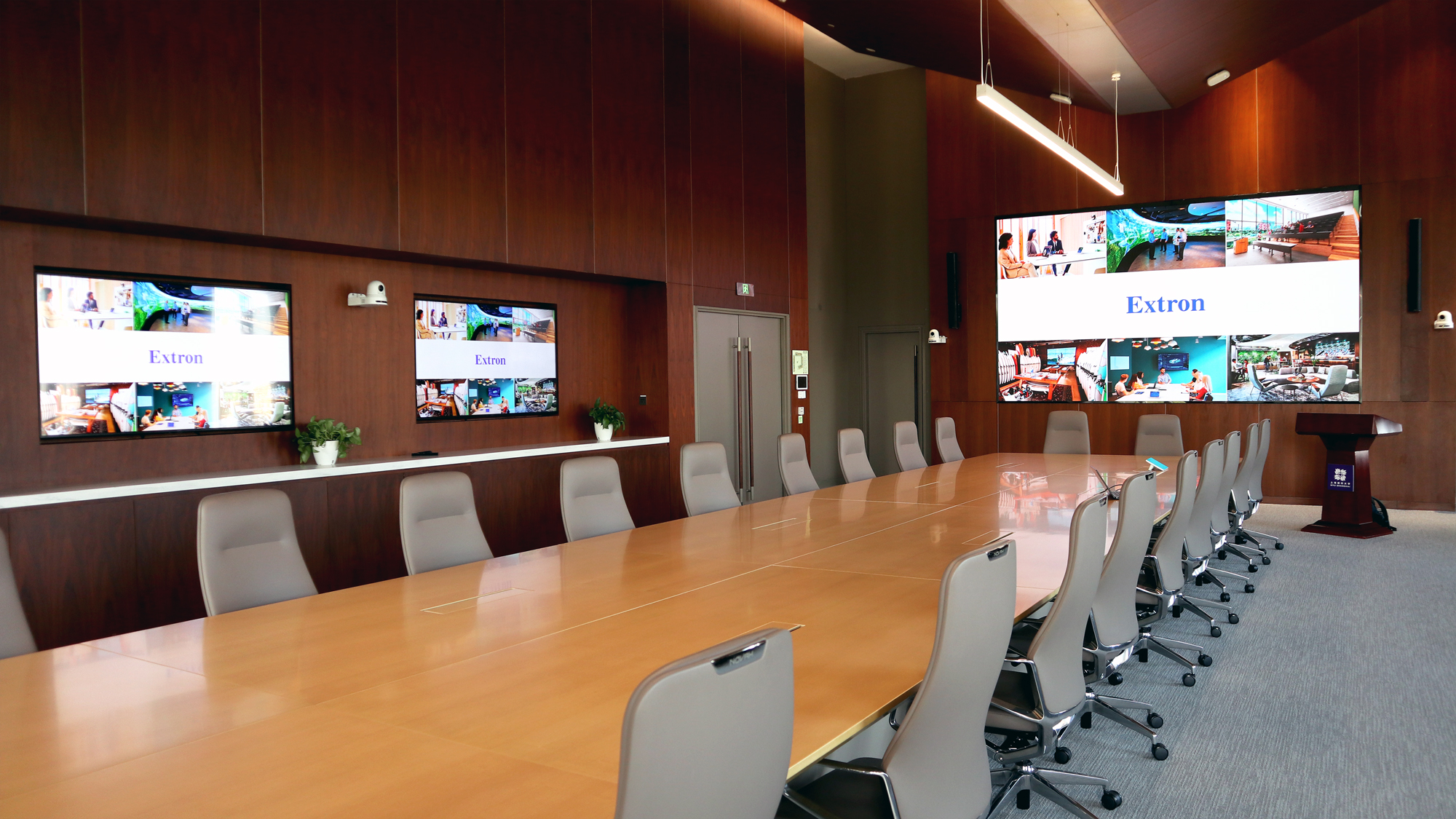 Conference rooms at NYU Shanghai feature multiple wall-mounted displays for dynamic presentations, with podiums incorporating Extron solutions for streamlined connectivity for signal routing.<br><br>Photos courtesy of NYU Shanghai.