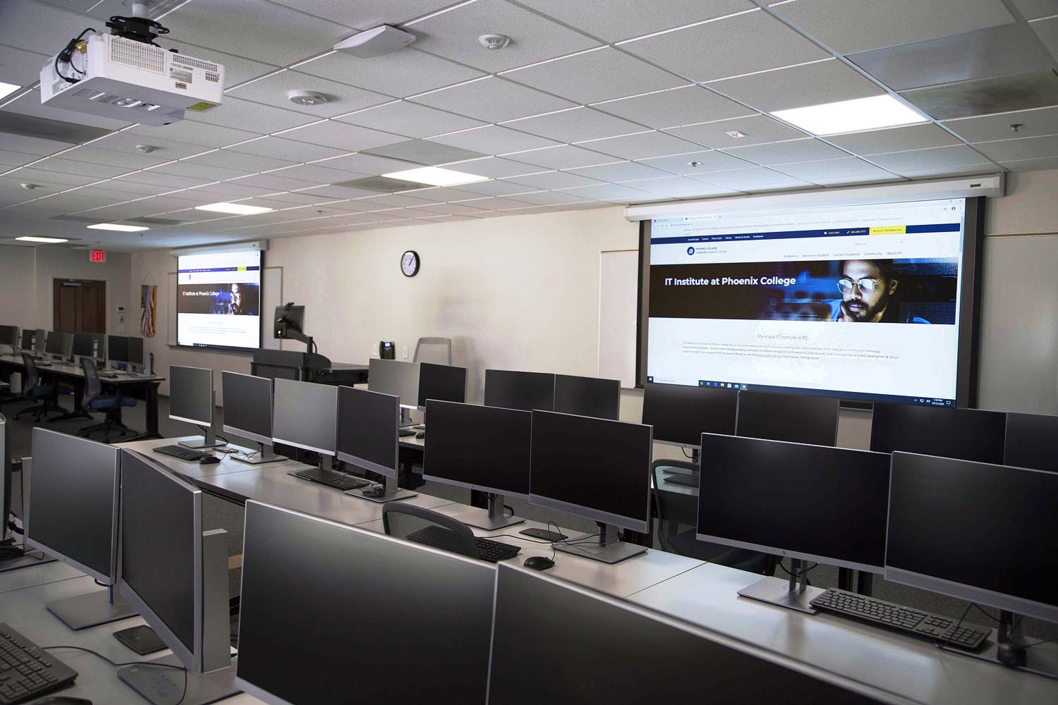 Two-projector classroom. There are also smaller classrooms equipped with one projector or 75” flat panel displays.