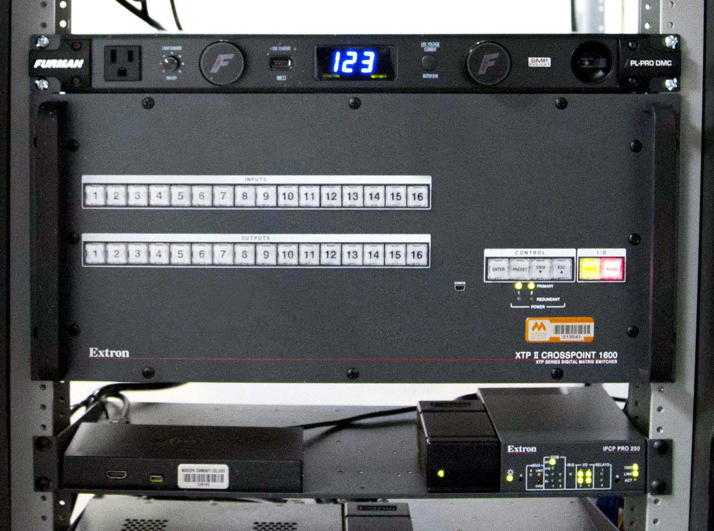 Cybersecurity classroom AV switching, distribution, and control rack.