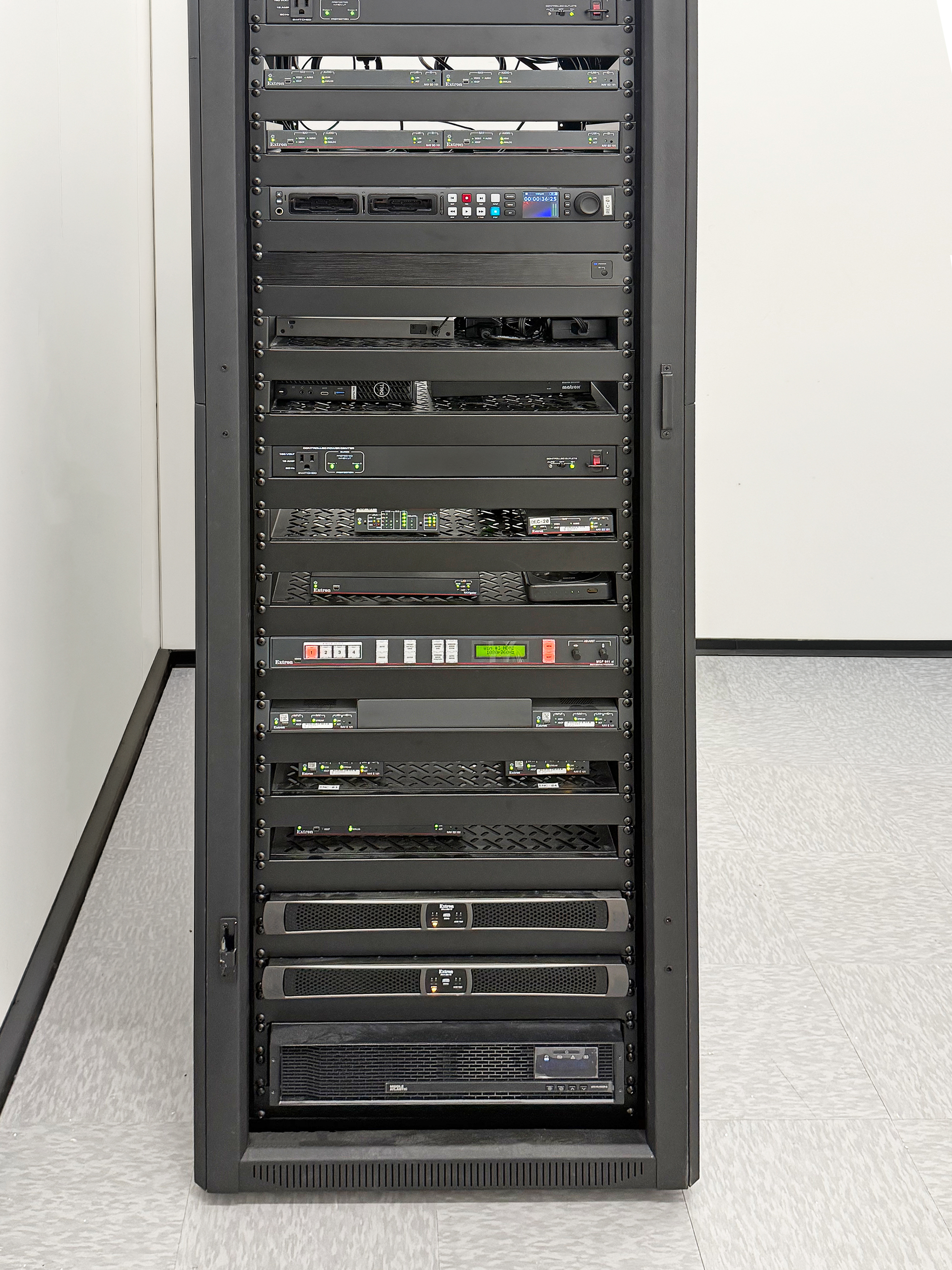 Centralized AV rack with Extron technology powering a high-performance esports environment.