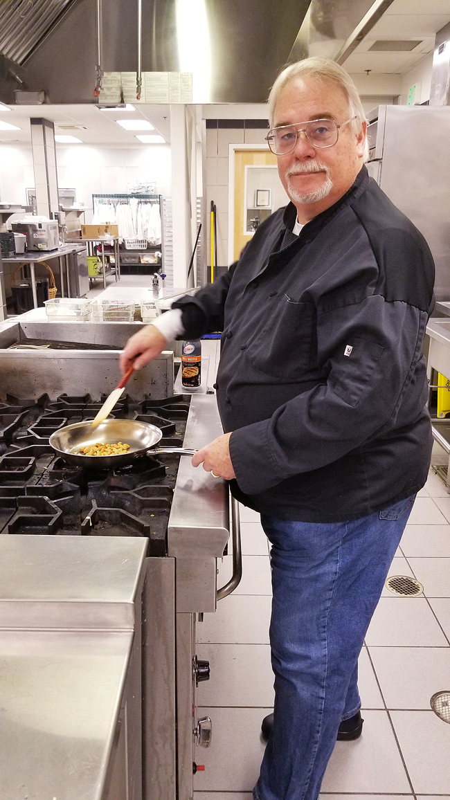 A happy Chef Karl Turner III has gone from wearing a GoPro to using a complete AV system with signal switching and distribution over a NAV Pro AV over IP installation.