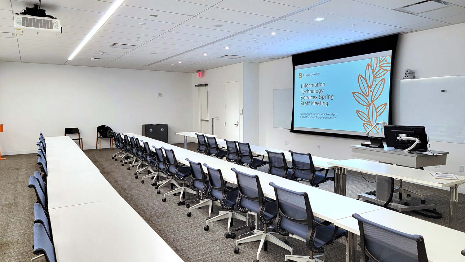 Traditional classrooms include a projection system, with the instructor workstation to one side.