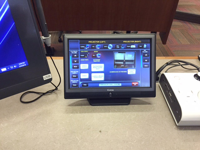 An Extron TLP 1000TV 10” Tabletop TouchLink Touchpanel at the Teacher Station