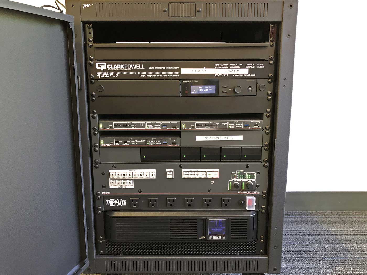 Classroom AV Equipment Rack. The DTP CrossPoint switcher responds to user selections made at a TLP Pro TouchPanel, sending chosen content to each screen.