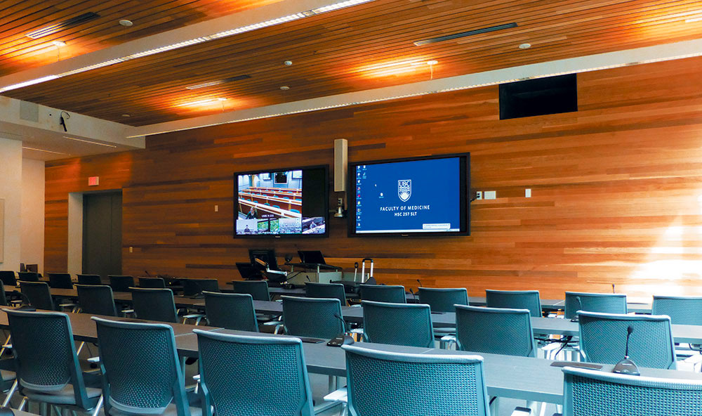 A distance education classroom at a regional medical school with two large displays.